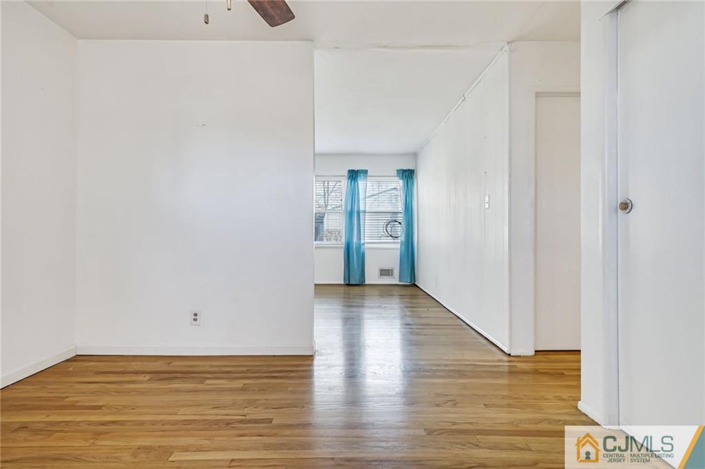 3020 Cheesequake Road Old Bridge, NJ 08859 - Photo 3 of 25 a view of a room with wooden floor