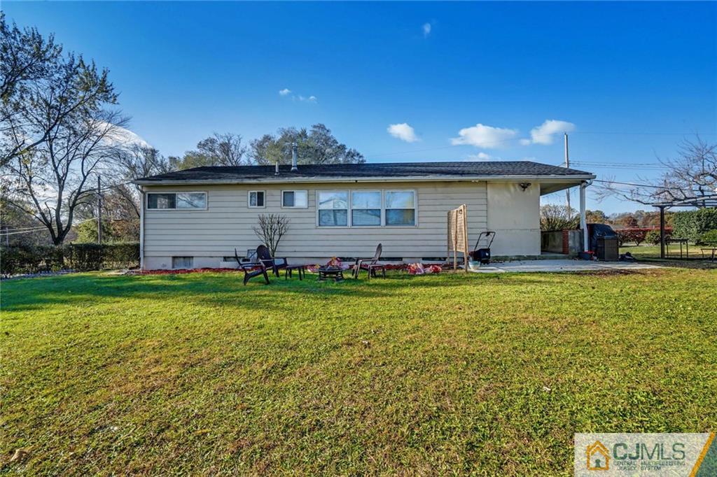 3020 Cheesequake Road Old Bridge, NJ 08859 - Photo 25 of 25 a view of a house with a backyard