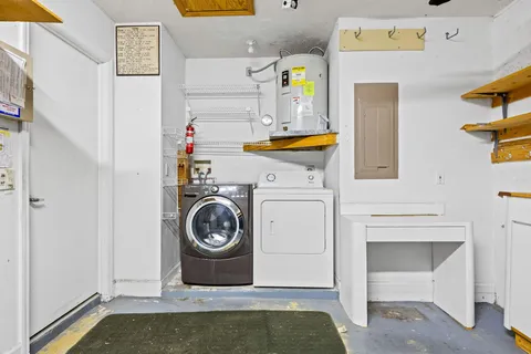 a utility room with dryer and washer