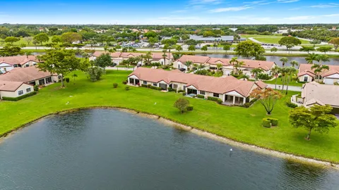 an aerial view of a house with a garden