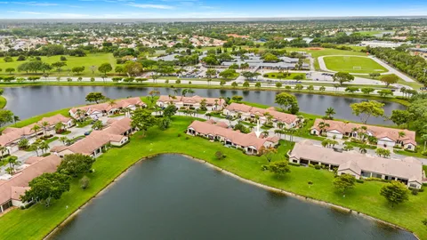an aerial view of a city with lake view