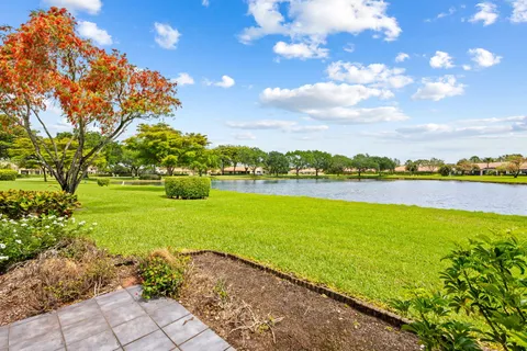 a view of a lake with a big yard