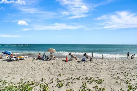 a view of a lake with beach