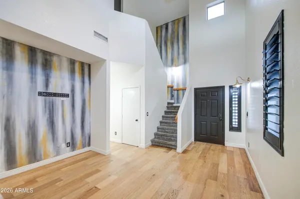 a view of an entryway with staircase