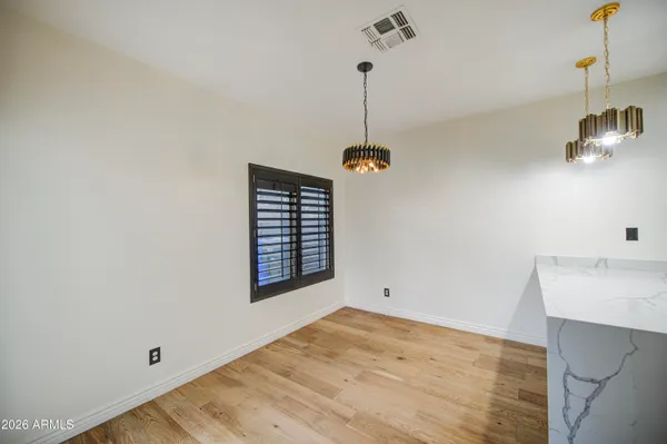 a view of empty room with a window