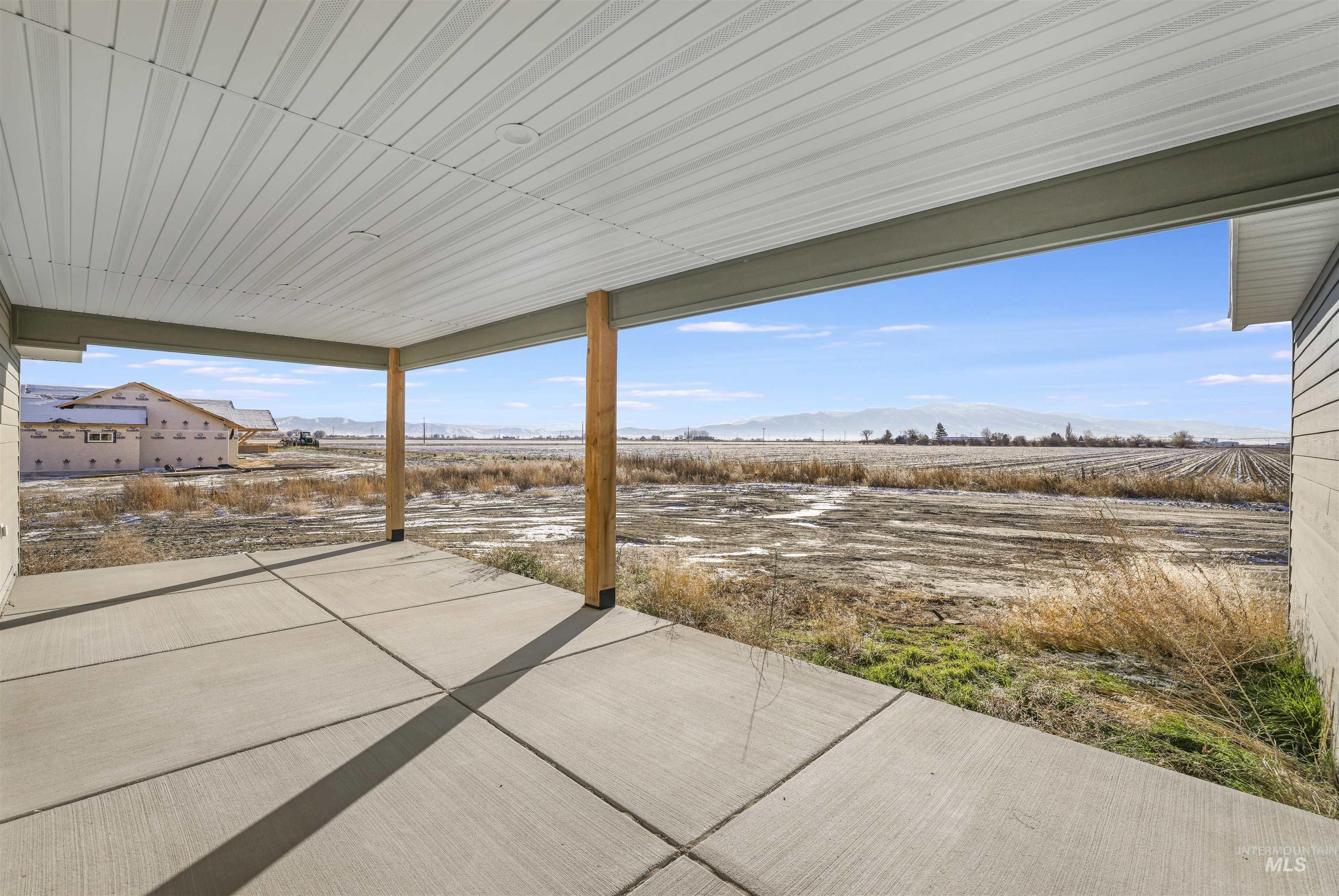 262 Ferdinand Circle Burley, ID 83318 - Photo 37 of 50 View of patio / terrace featuring a mountain view and a rural view