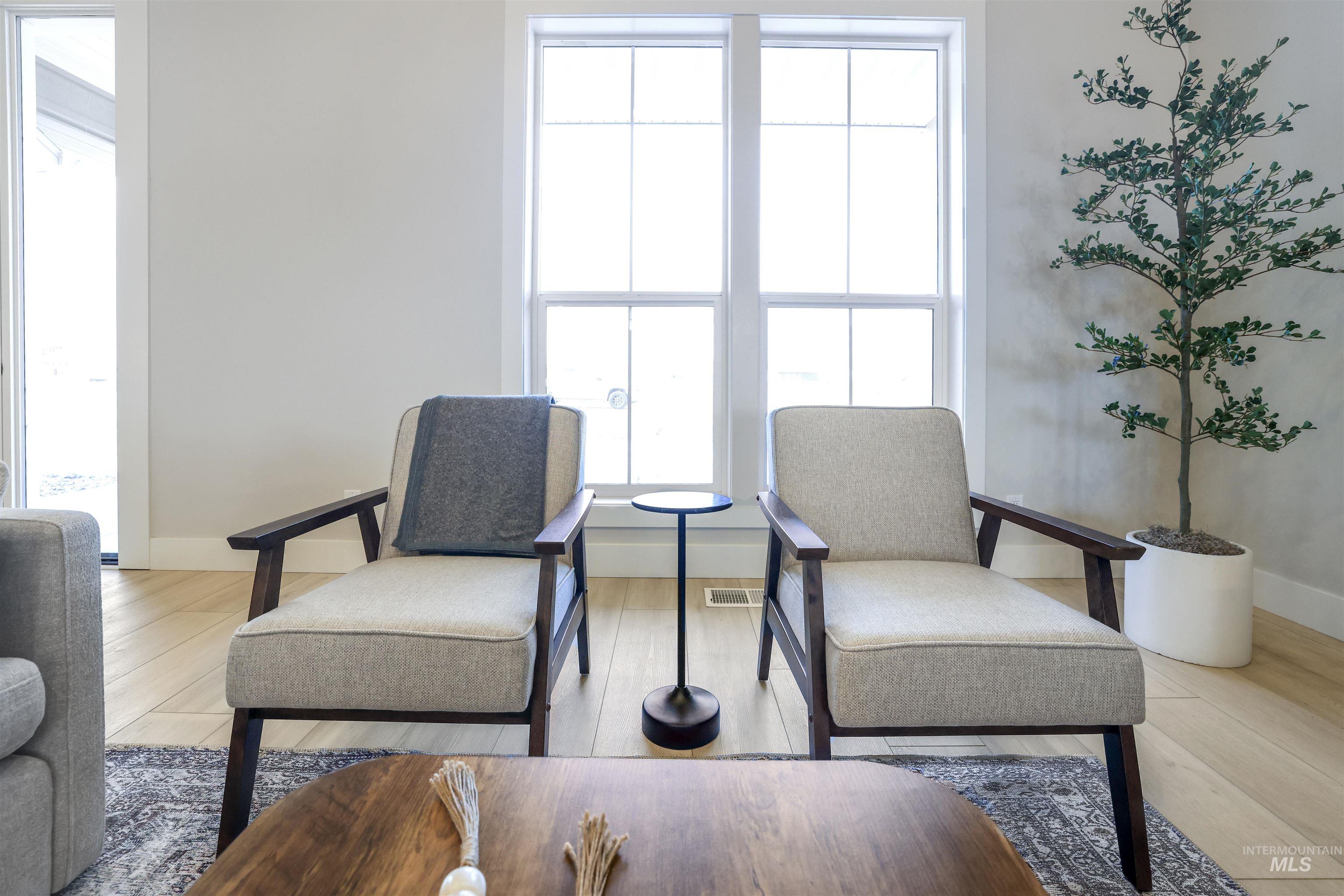 262 Ferdinand Circle Burley, ID 83318 - Photo 6 of 50 Living area with healthy amount of natural light and light wood-style flooring