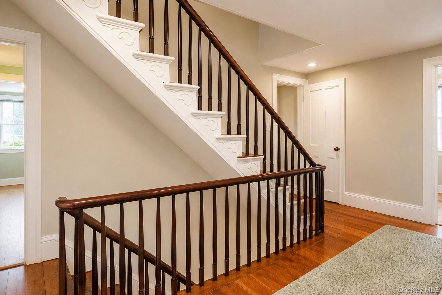 340 Dunn Road Montgomery, NY 12549 - Photo 24 of 34 View of the stairway in the hall area to the attic and original wide wood plank flooring