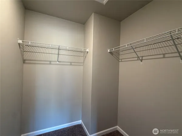 a view of a room with racks on the wall