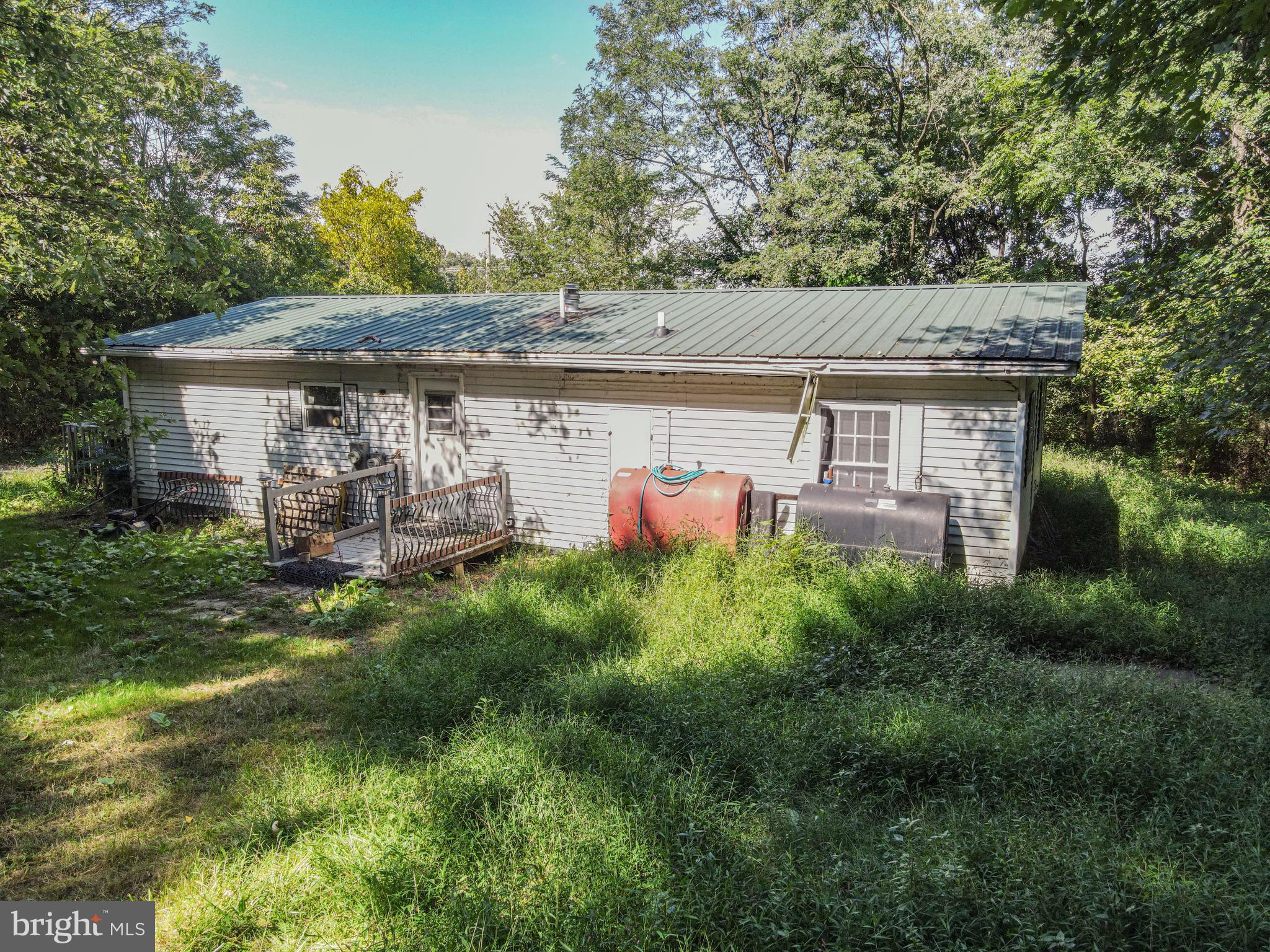 2017 Castleton Road Darlington, MD 21034 - Photo 4 of 28 a view of a patio with table and chairs and potted plants