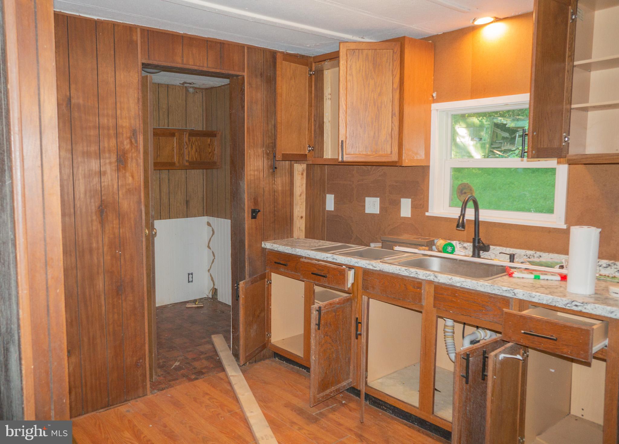 2017 Castleton Road Darlington, MD 21034 - Photo 6 of 28 a kitchen with a sink and a large window