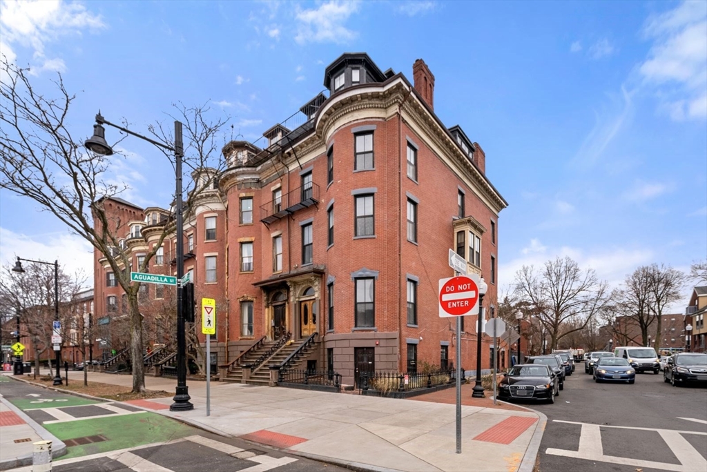 662 Tremont Street, Unit 3 Boston, MA 02118 - Photo 15 of 15 a view of a street with cars