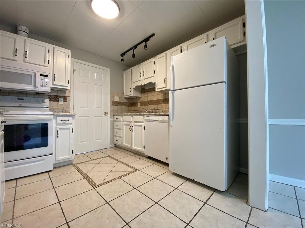 4906 Tower Road, Unit B Greensboro, NC 27410 - Photo 2 of 18 Kitchen appliances remain