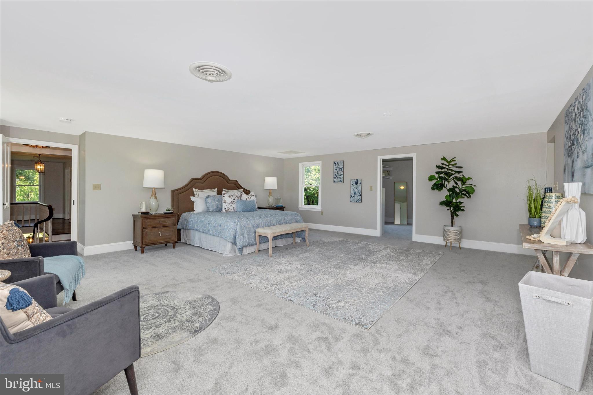 8423 Yellow Springs Road Frederick, MD 21702 - Photo 114 of 136 a living room with furniture and a potted plant