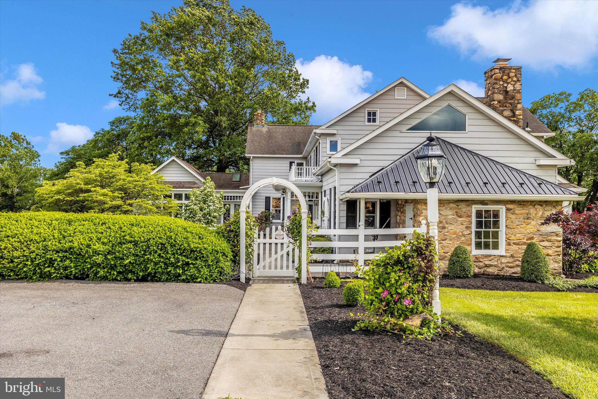8423 Yellow Springs Road Frederick, MD 21702 - Photo 12 of 136 a front view of house with yard and green space