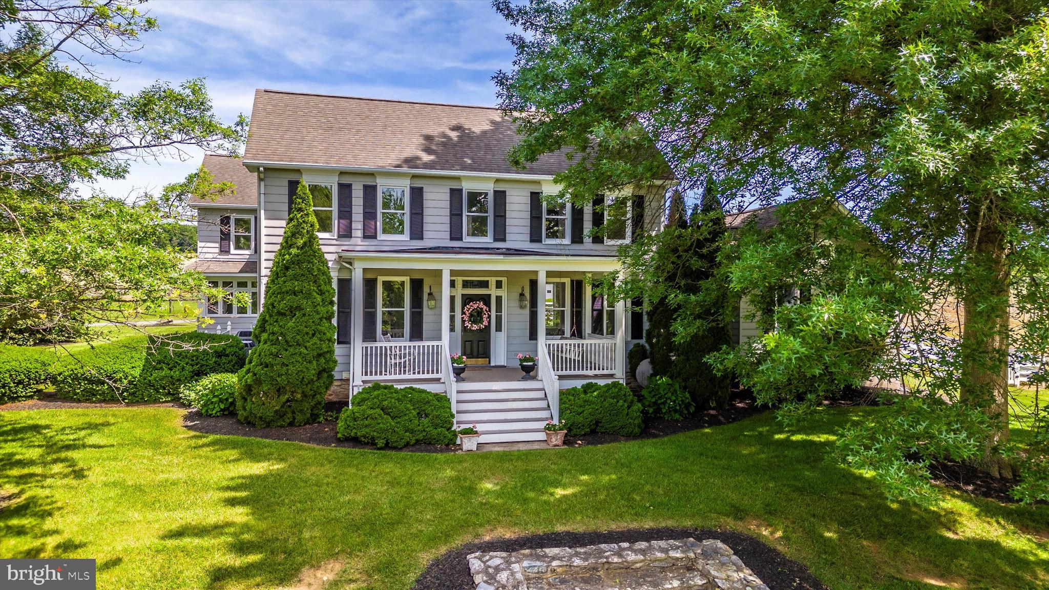 8423 Yellow Springs Road Frederick, MD 21702 - Photo 16 of 136 a front view of a house with a yard