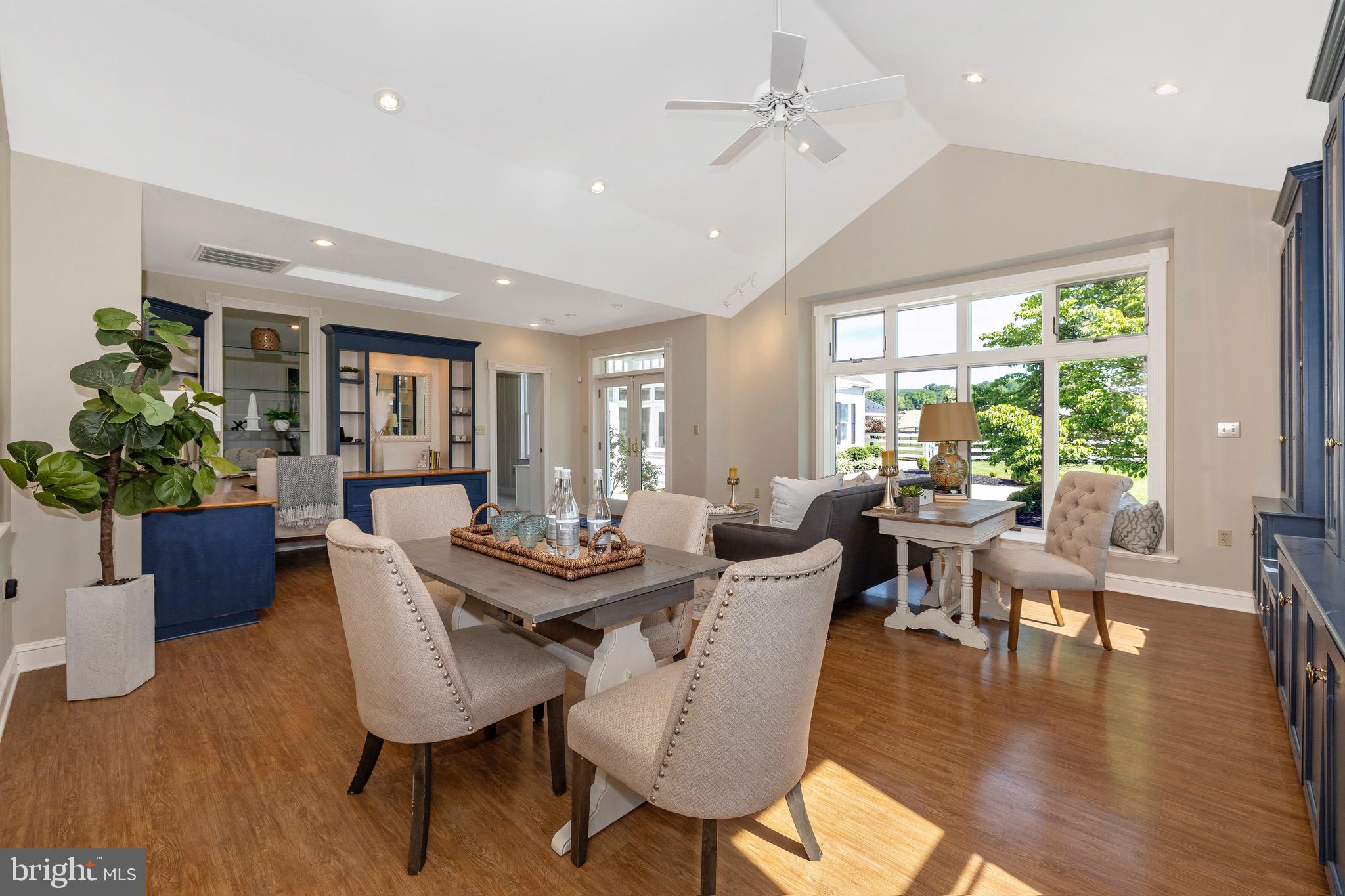 8423 Yellow Springs Road Frederick, MD 21702 - Photo 21 of 136 a view of a dining room with furniture window and wooden floor