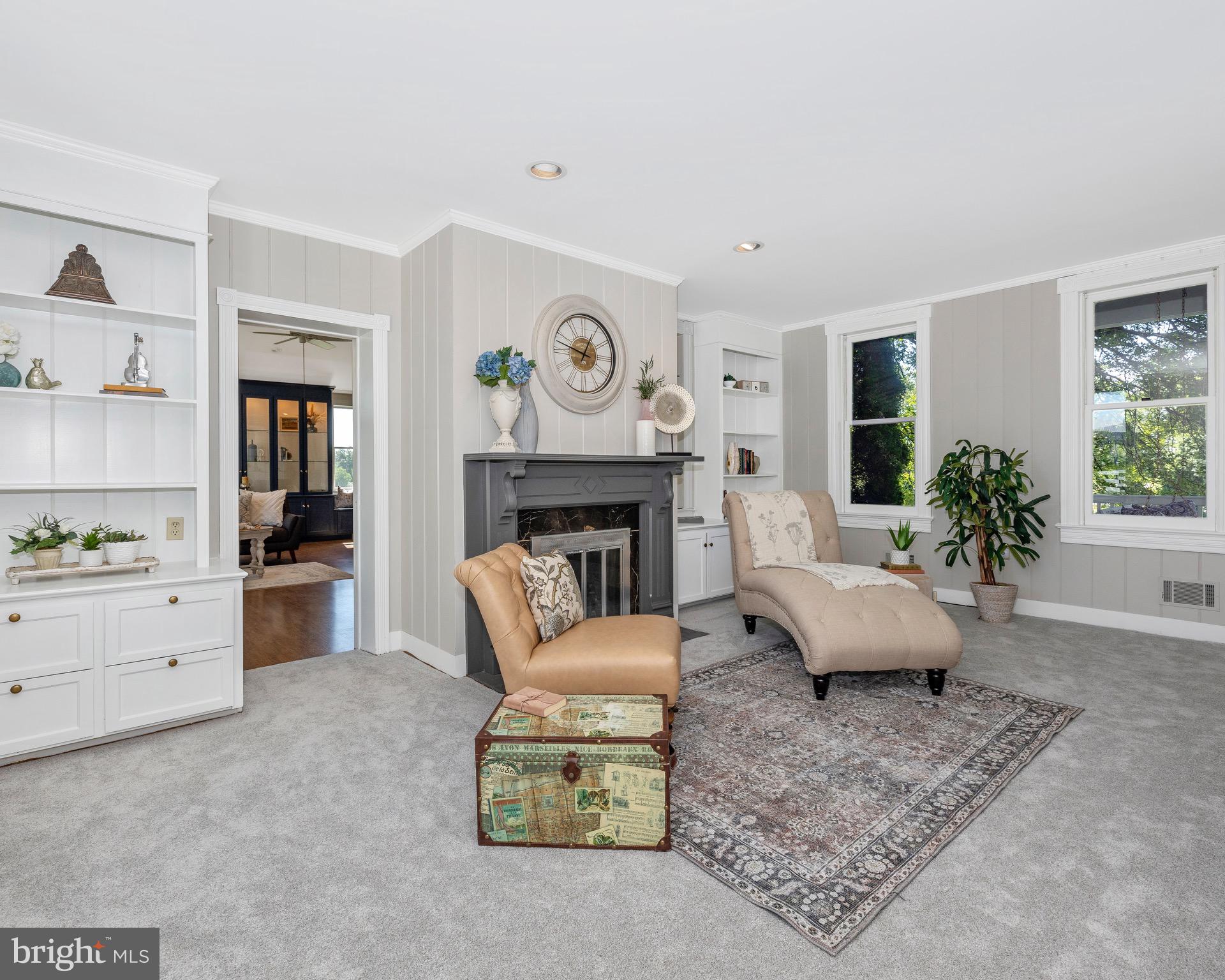 8423 Yellow Springs Road Frederick, MD 21702 - Photo 26 of 136 a living room with furniture and a fireplace
