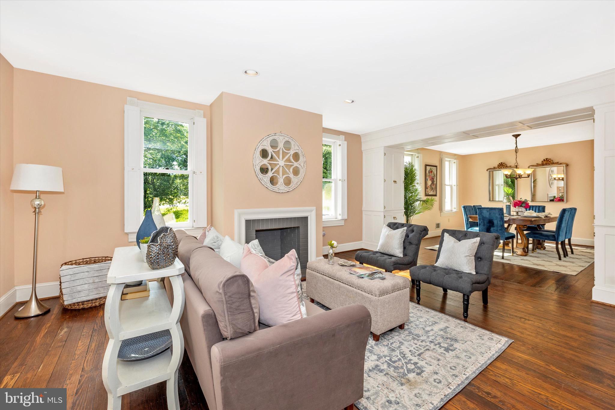 8423 Yellow Springs Road Frederick, MD 21702 - Photo 33 of 136 a living room with furniture a fireplace and a large window