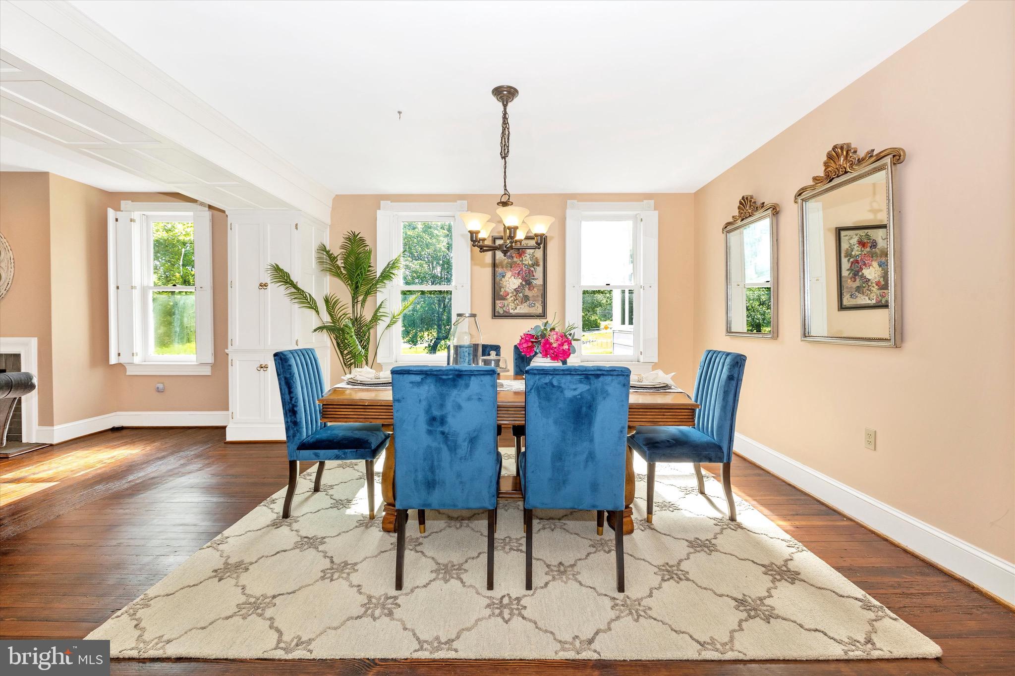 8423 Yellow Springs Road Frederick, MD 21702 - Photo 36 of 136 a view of a dining room with furniture window and wooden floor