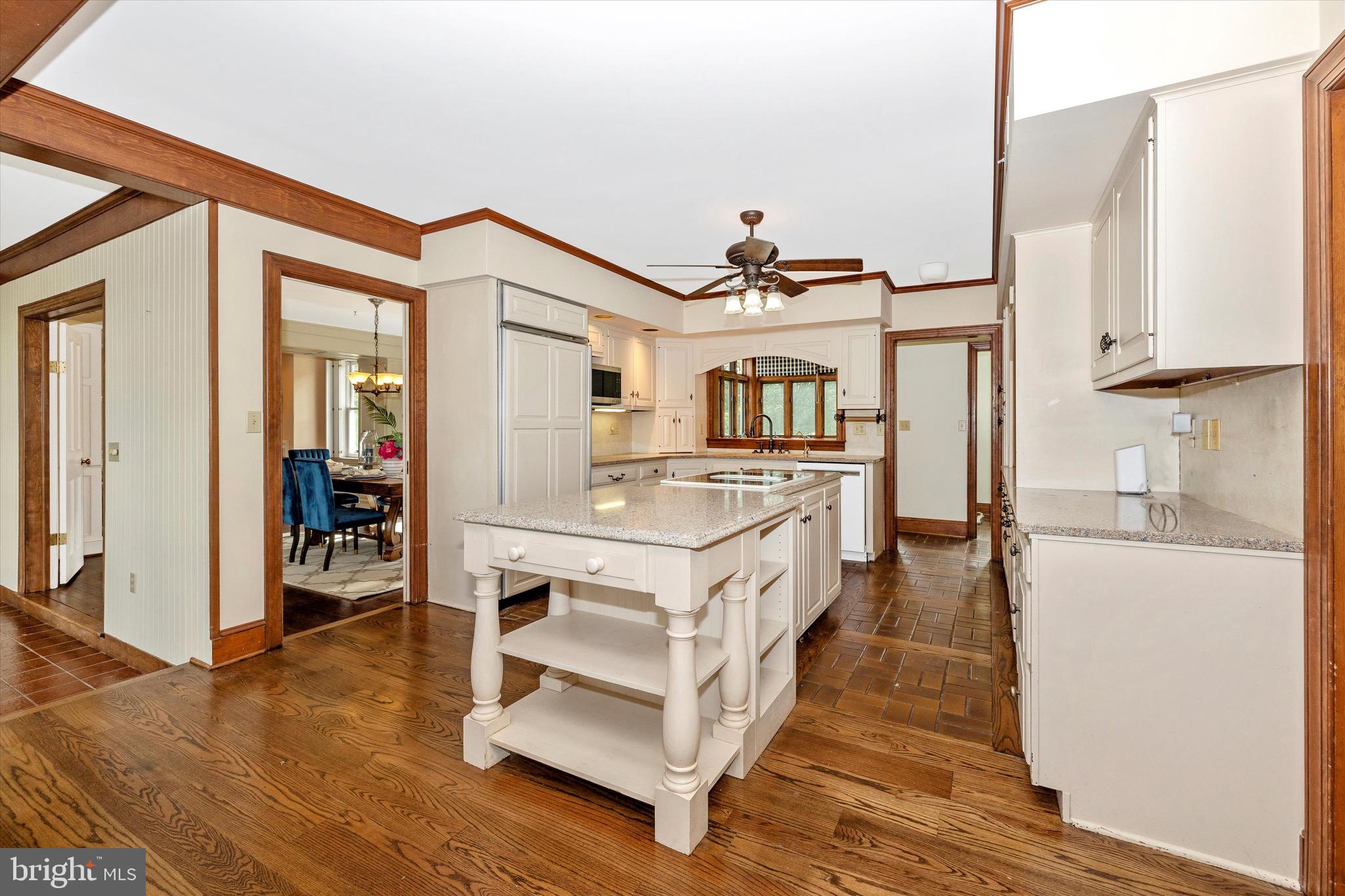8423 Yellow Springs Road Frederick, MD 21702 - Photo 40 of 136 a open kitchen with stainless steel appliances granite countertop a stove and a refrigerator with white cabinets