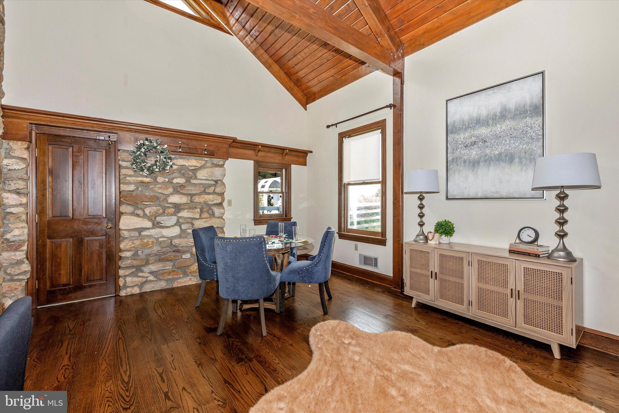 8423 Yellow Springs Road Frederick, MD 21702 - Photo 48 of 136 a living room with furniture and a wooden floor
