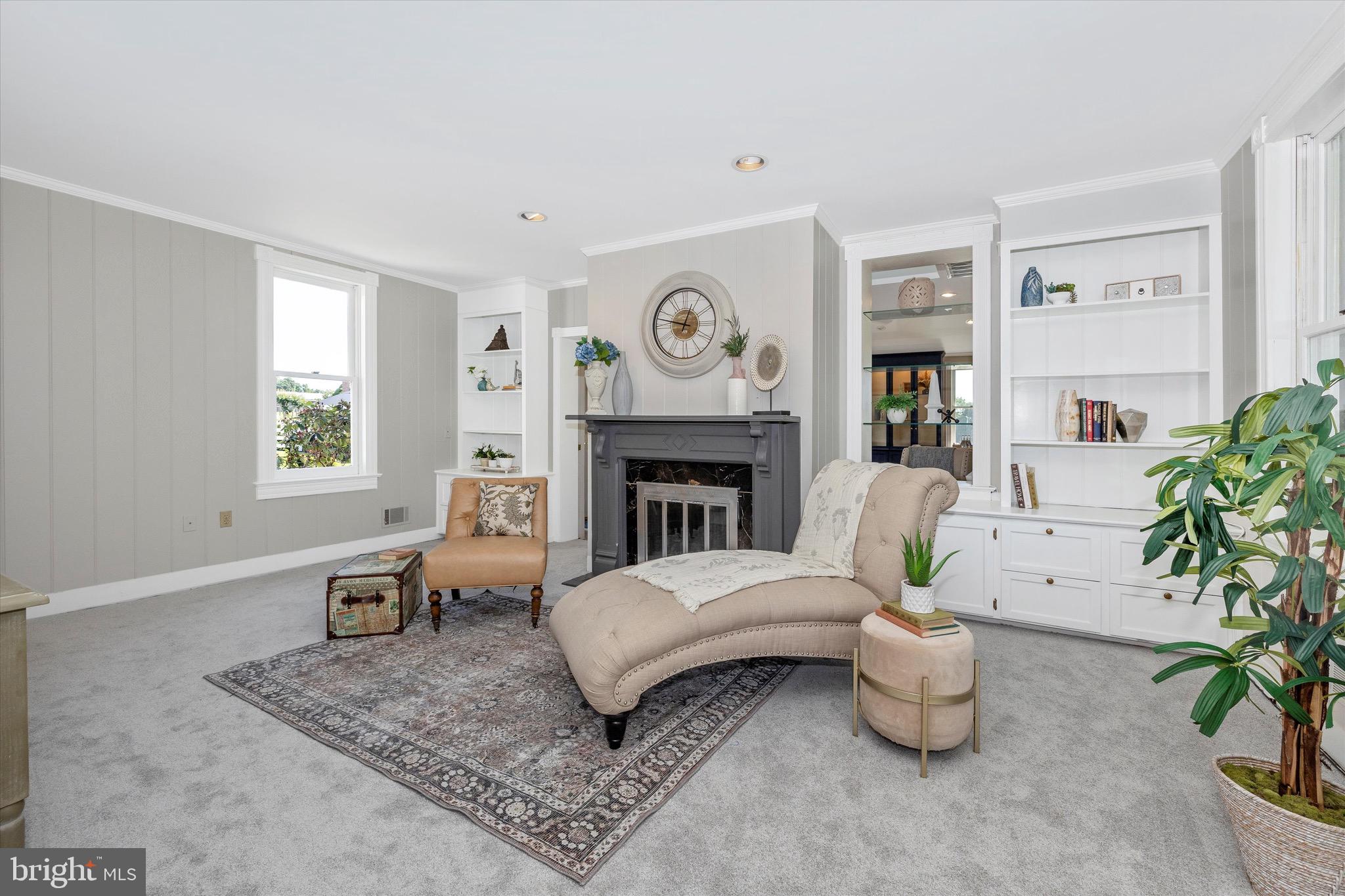 8423 Yellow Springs Road Frederick, MD 21702 - Photo 68 of 136 a living room with furniture a window and a fireplace