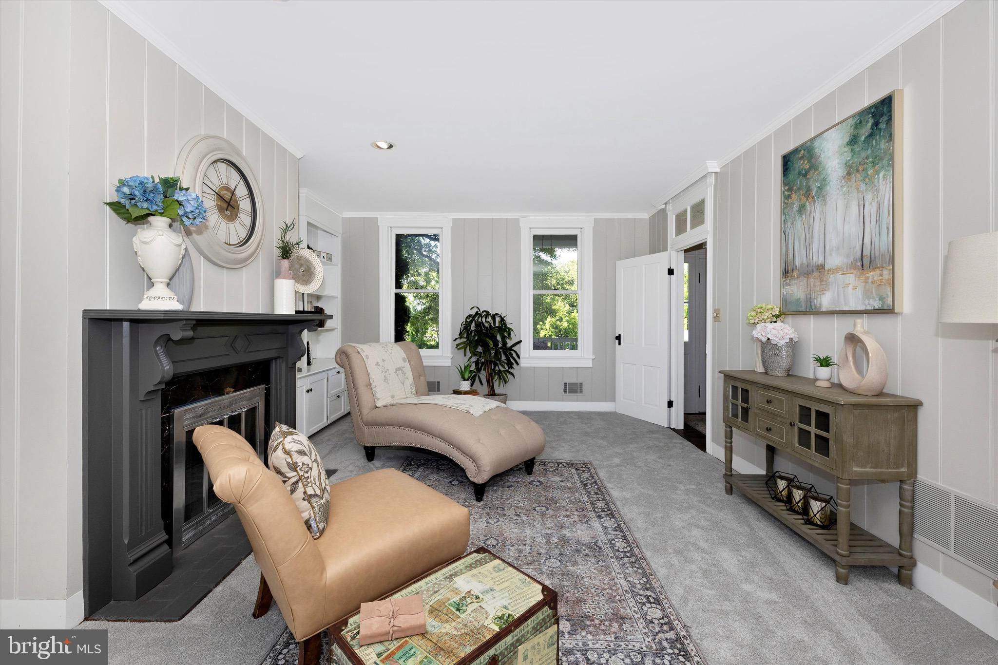 8423 Yellow Springs Road Frederick, MD 21702 - Photo 70 of 136 a living room with furniture a fireplace and a window