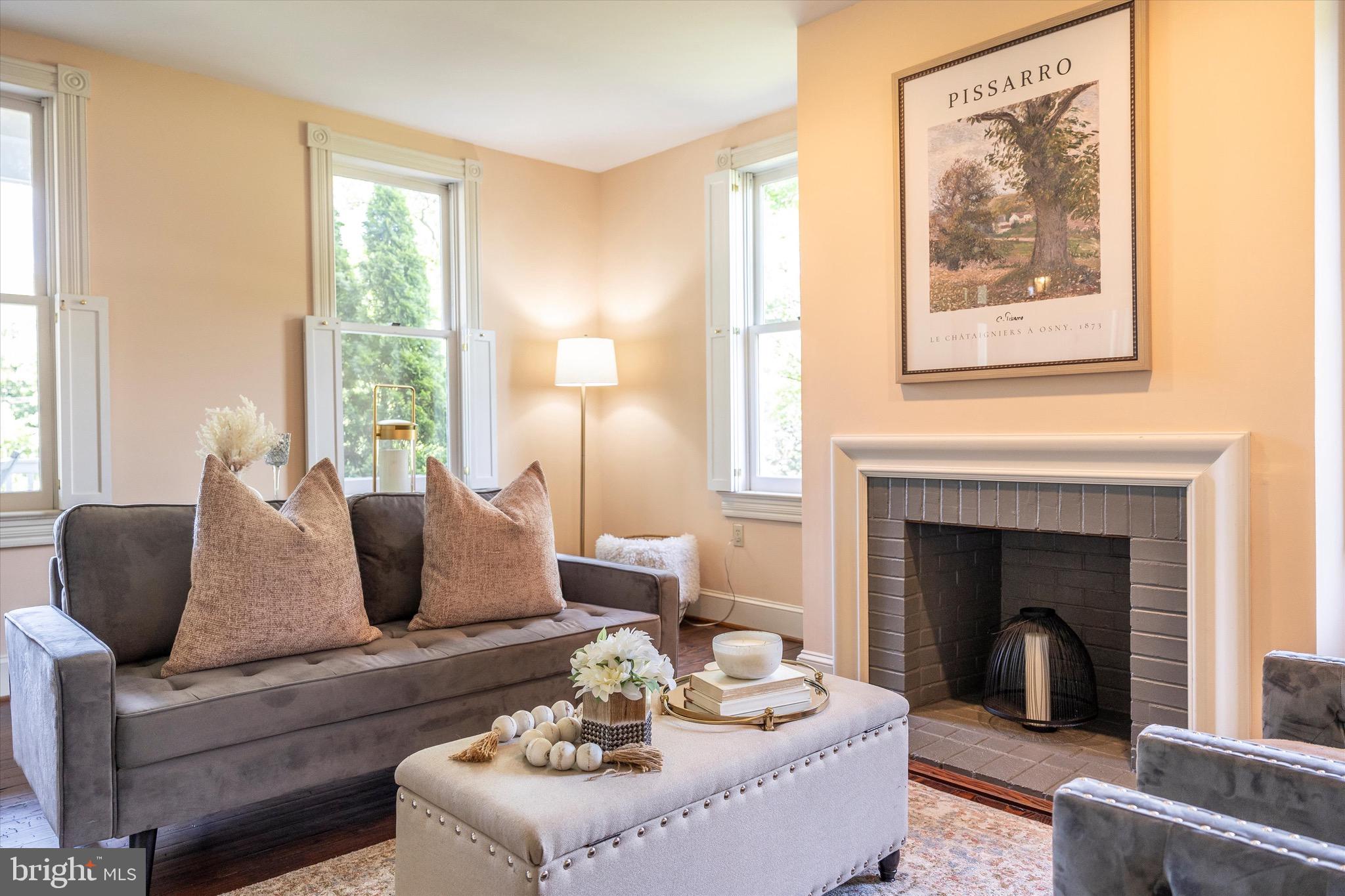 8423 Yellow Springs Road Frederick, MD 21702 - Photo 82 of 136 a living room with furniture and a fireplace