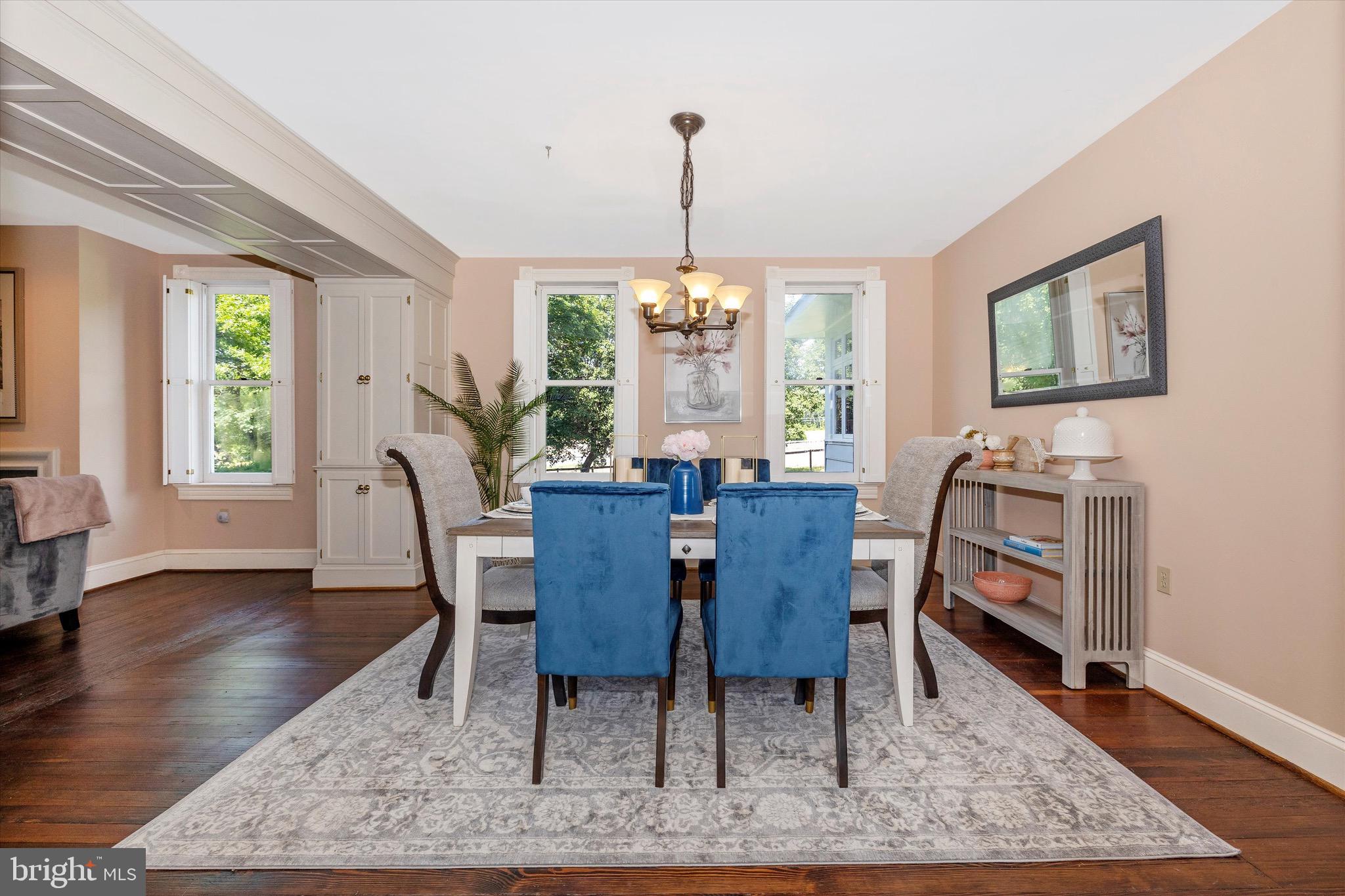 8423 Yellow Springs Road Frederick, MD 21702 - Photo 83 of 136 a view of a dining room with furniture window and wooden floor