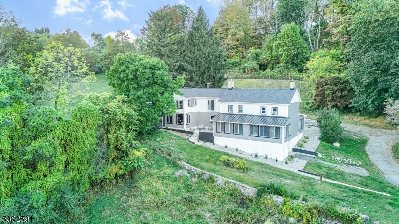 49 Mt Pleasant Road Columbia, NJ 07832 - Photo 1 of 47 an aerial view of a house with a yard