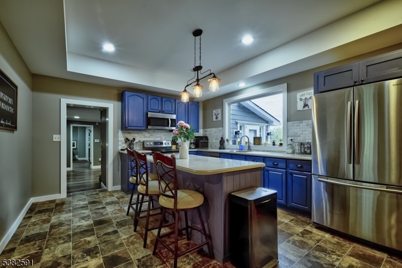 49 Mt Pleasant Road Columbia, NJ 07832 - Photo 15 of 47 a kitchen with stainless steel appliances granite countertop a refrigerator a sink dishwasher a stove and a refrigerator