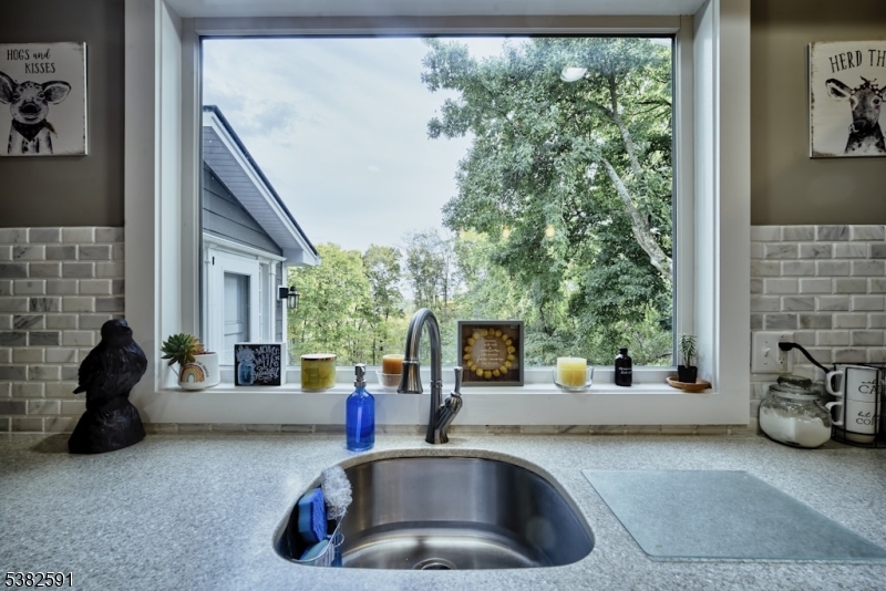 49 Mt Pleasant Road Columbia, NJ 07832 - Photo 17 of 47 a kitchen with a sink and a large window