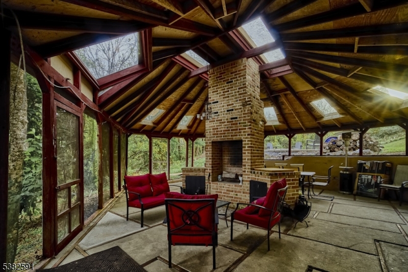 49 Mt Pleasant Road Columbia, NJ 07832 - Photo 21 of 47 a view of a chairs and table in the patio
