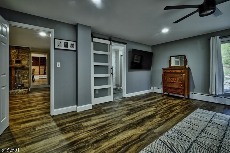 49 Mt Pleasant Road Columbia, NJ 07832 - Photo 26 of 47 a view of a bedroom with wooden floor & cabinet