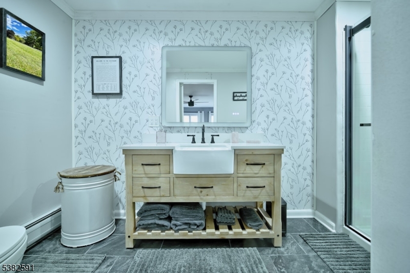 49 Mt Pleasant Road Columbia, NJ 07832 - Photo 27 of 47 a bathroom with a sink toilet and mirror