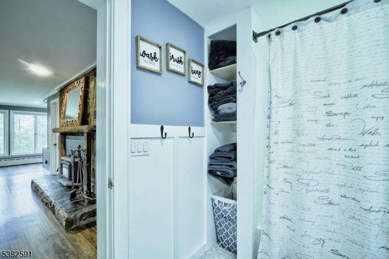 49 Mt Pleasant Road Columbia, NJ 07832 - Photo 30 of 47 a bathroom with a bathtub and shower