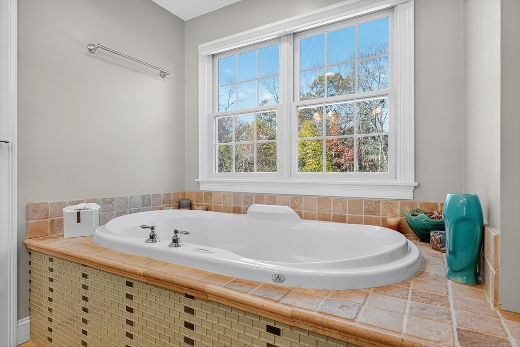 6 Colby Road Danvers, MA 01923 - Photo 24 of 42 a bath tub sitting next to a window