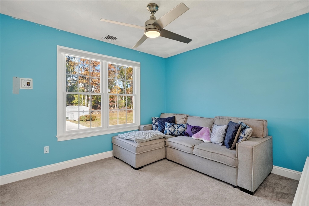 6 Colby Road Danvers, MA 01923 - Photo 27 of 42 a living room with furniture and a window