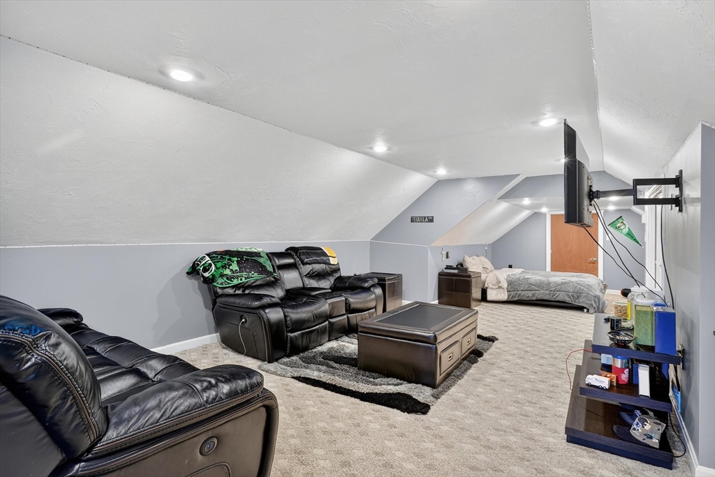 6 Colby Road Danvers, MA 01923 - Photo 30 of 42 a living room with furniture and a couch