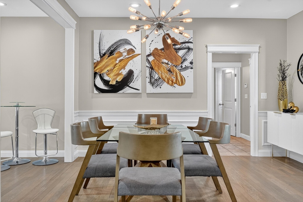 6 Colby Road Danvers, MA 01923 - Photo 10 of 42 a view of a dining room with furniture and wooden floor