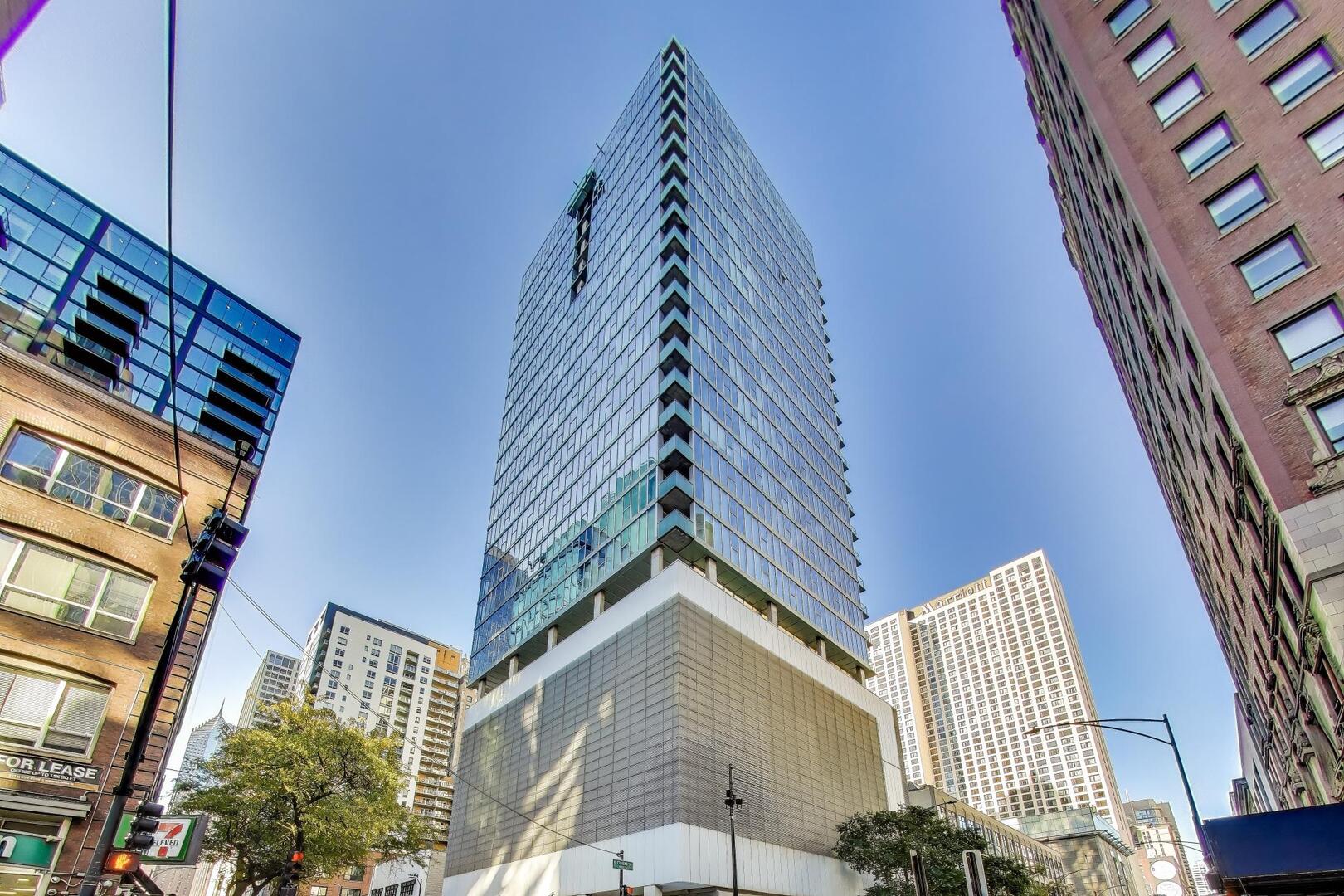 550 North St Clair Street, Unit 1303 Chicago, IL 60611 - Photo 1 of 20 a front view of a building