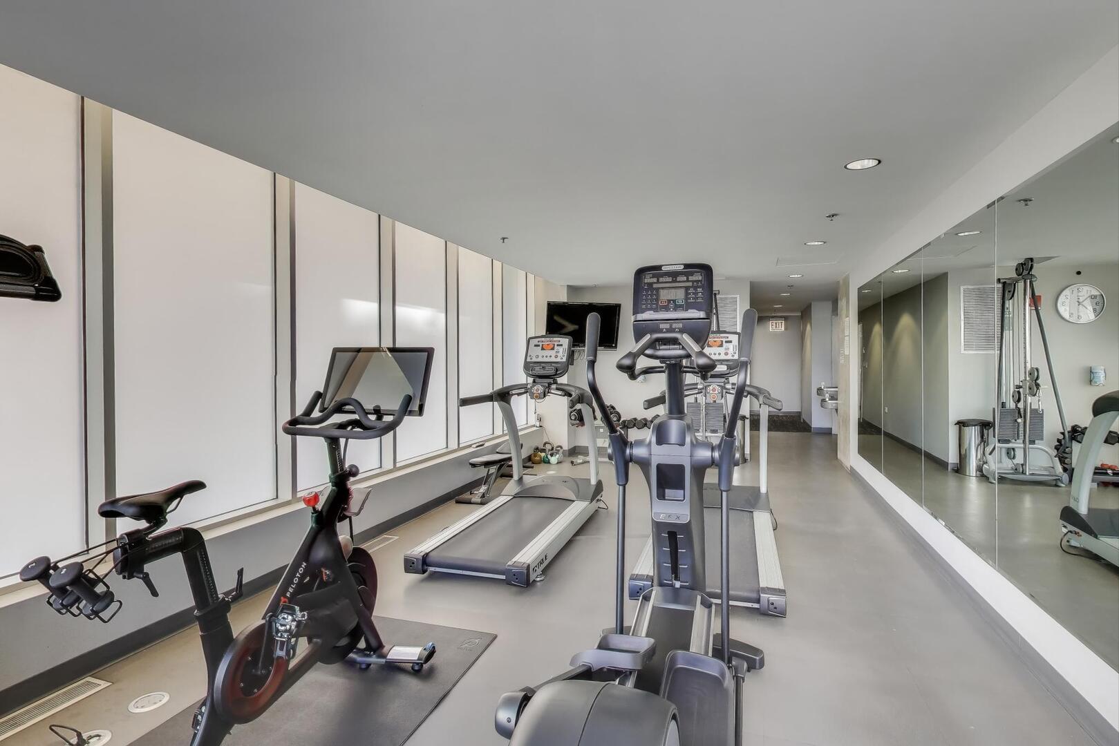 550 North St Clair Street, Unit 1303 Chicago, IL 60611 - Photo 15 of 20 a view of a room with gym equipment
