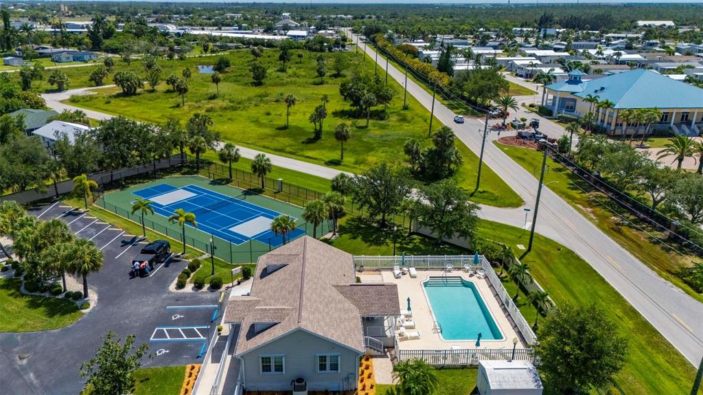 24604 Rio Villa Lakes Circle Punta Gorda, FL 33950 - Photo 20 of 28 an aerial view of residential houses with outdoor space