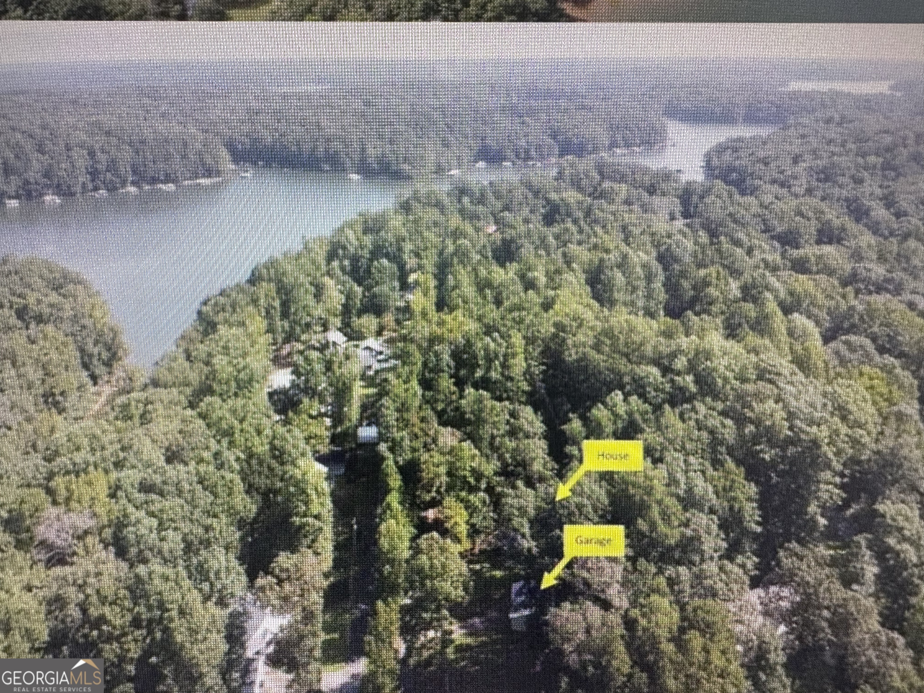 813 Normandy Trail Lavonia, GA 30553 - Photo 26 of 32 a aerial view of a house with a yard and swimming pool