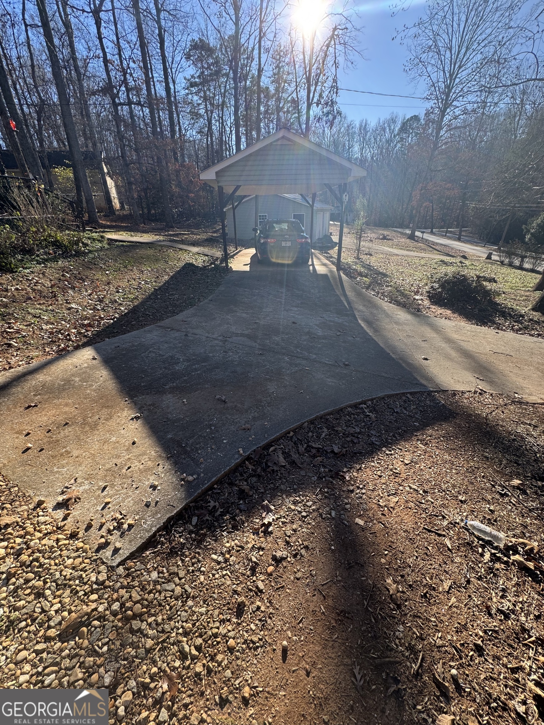 813 Normandy Trail Lavonia, GA 30553 - Photo 4 of 32 a view of a backyard of the house