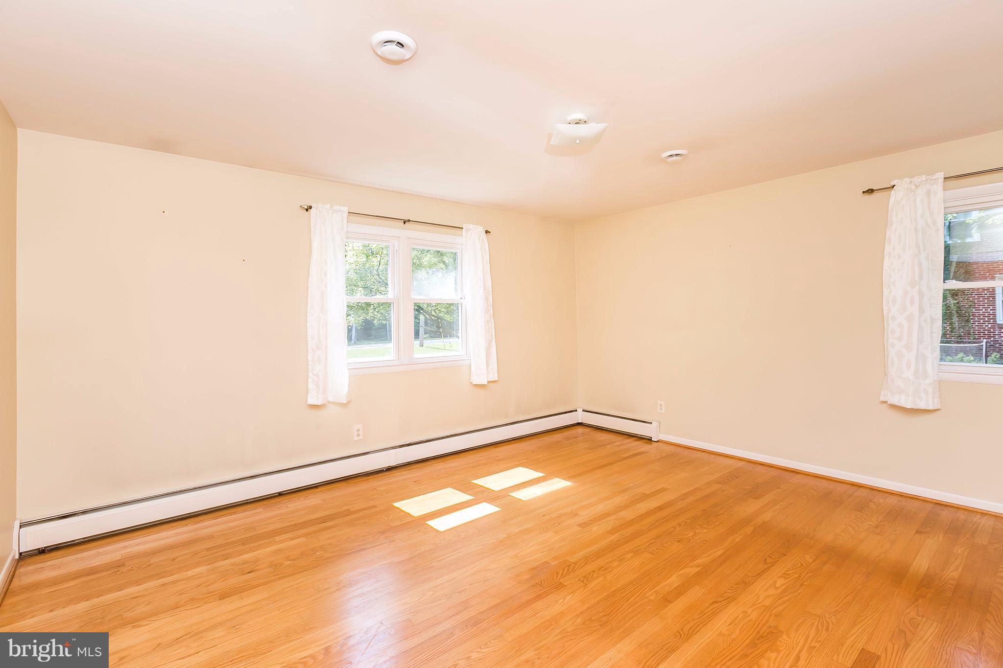 8944 Satyr Hill Road Baltimore, MD 21234 - Photo 11 of 29 Large Master Bedroom with lovely wood floors