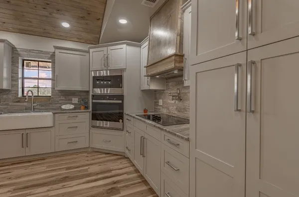 a bathroom with sink and mirror