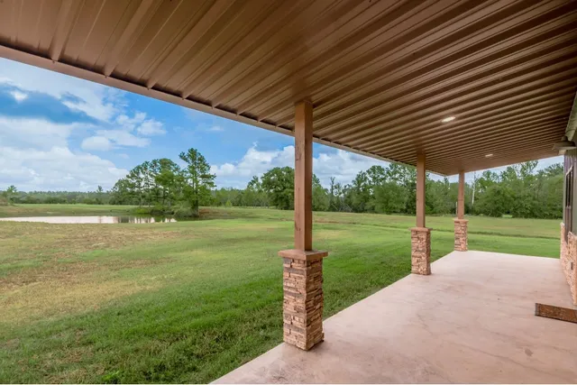 a view of a backyard with a garden