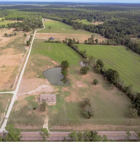 a view of a lake with a yard